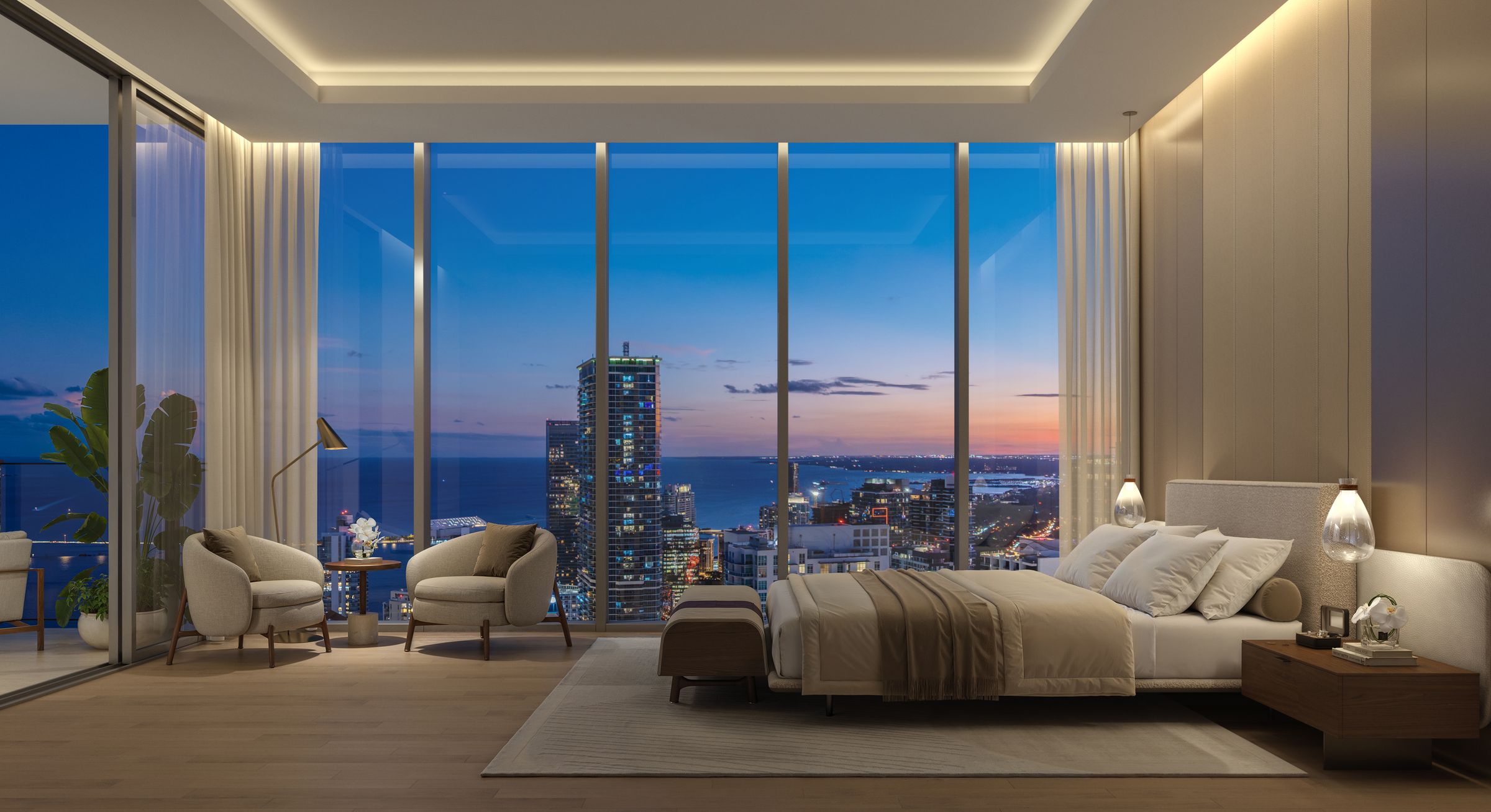 Primary bedroom oriented to panoramic water views